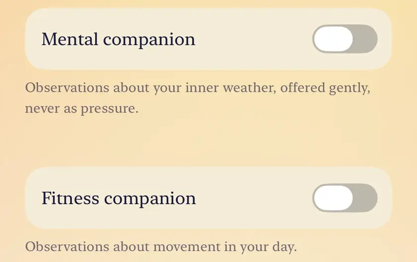 The Mental companion and Fitness companion switches on the Wellbeing screen, both off, each with one line on what it observes.